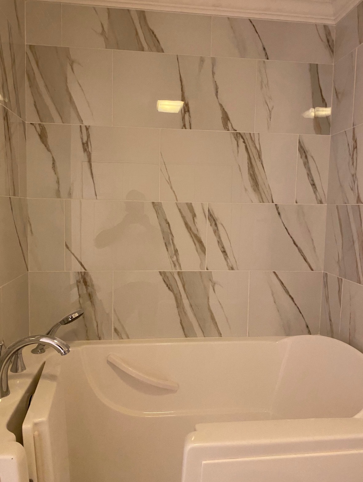Spa bathroom remodel completed with tile and walk-in shower